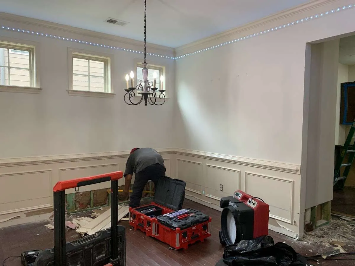 Restoration technician with professional equipment in Belmar