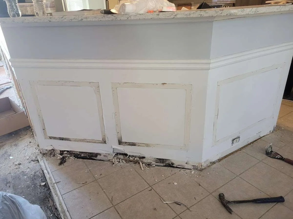 Water damage and mold on kitchen during Storm Damage Restoration in Belmar